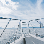A boat cruising around the sea of Ine.